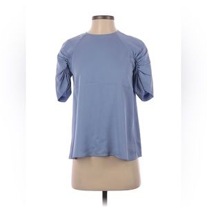NWT Gianni Bini touched short sleeve sky blue shirt.